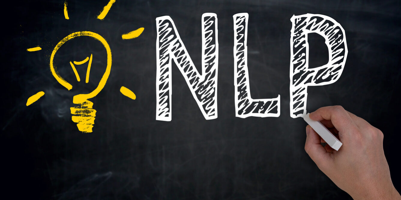 NLP is written by hand on blackboard